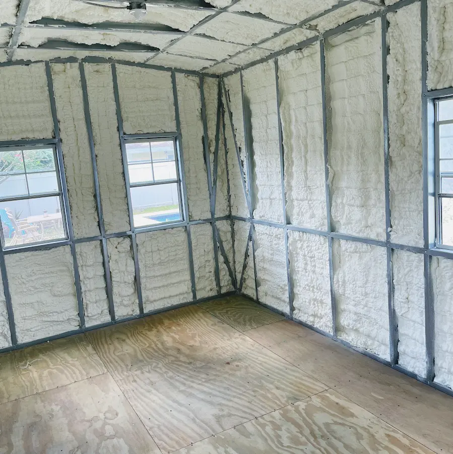 Closed-cell spray foam insulation applied to wall cavities in a residential project in Crossville